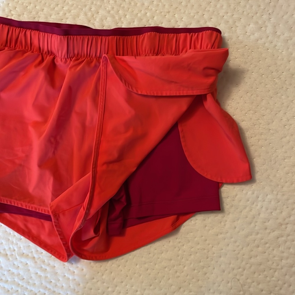 Orange/red Women’s Nike running shorts in size small - Picture 2 of 3
